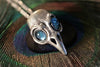 Silver Bird Skull pendant with Swiss Blue Topaz Eyes