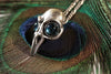 Silver Bird Skull pendant with Swiss Blue Topaz Eyes